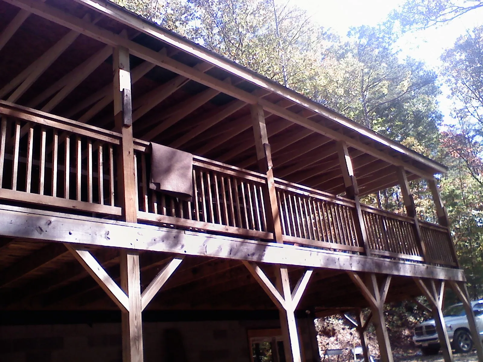 Timber framing under a new elevated porch and deck — Roof Leak Repair in Sun City Center by Roofing Brothers